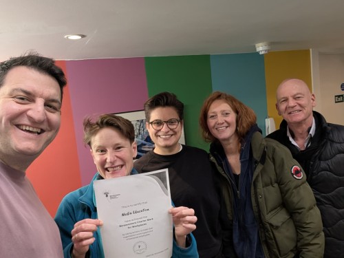 Media Education show off their Bereavement Charter Mark certificate
